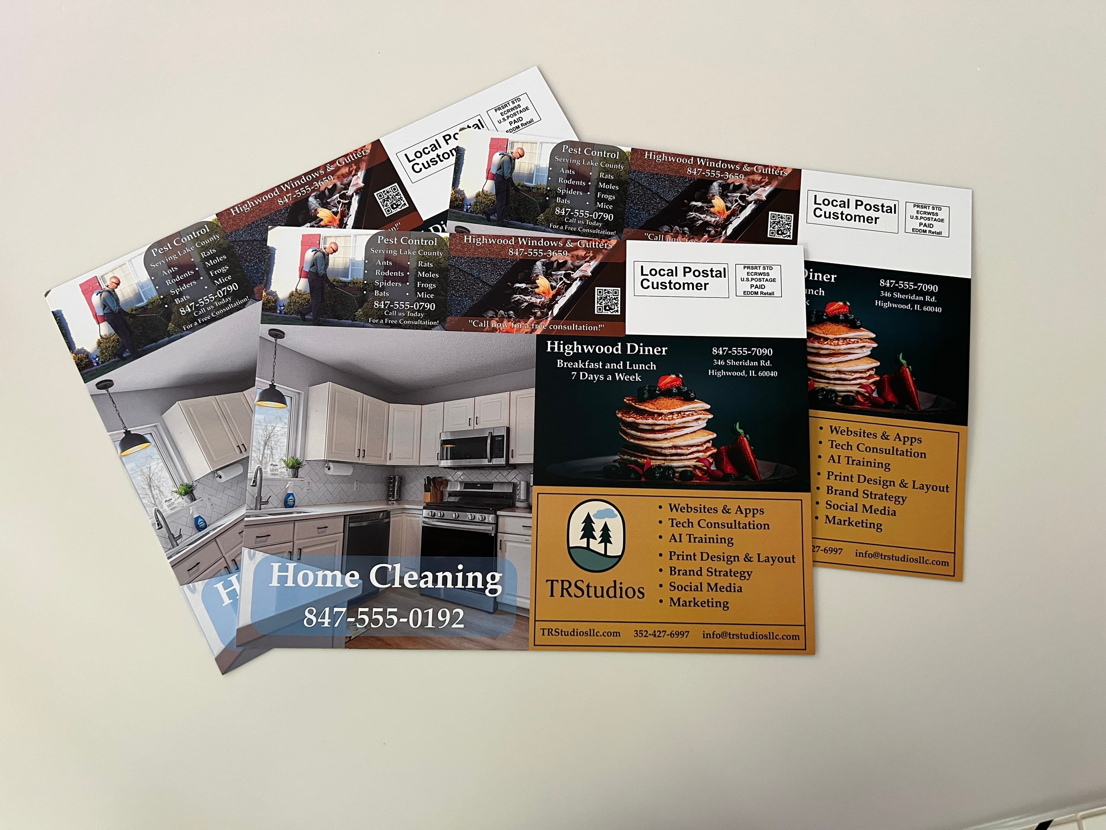 Front side of co-op mailer showing multiple business ads